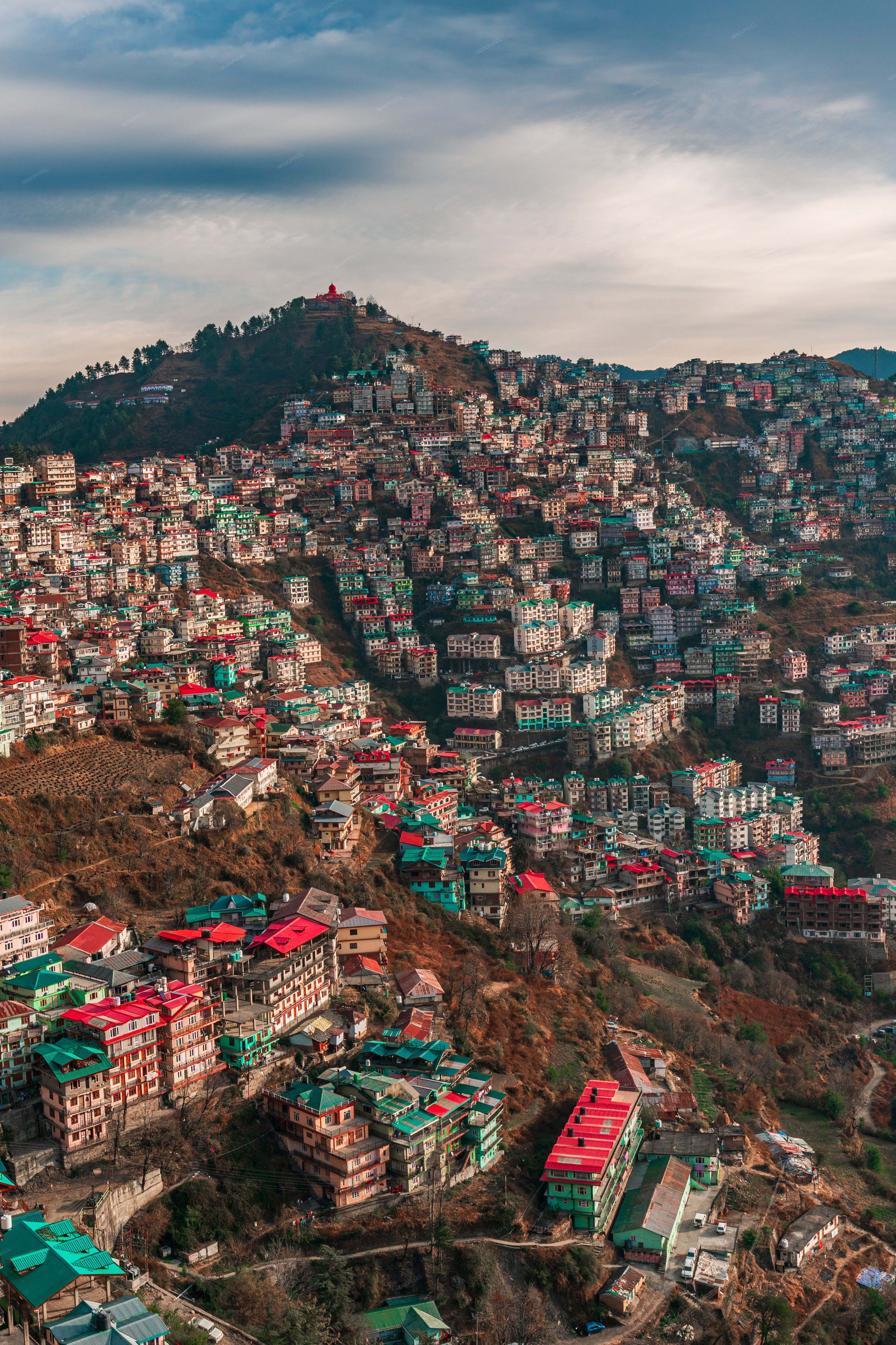 Aerial view of a mountainous region with numerous colorful - Full size view