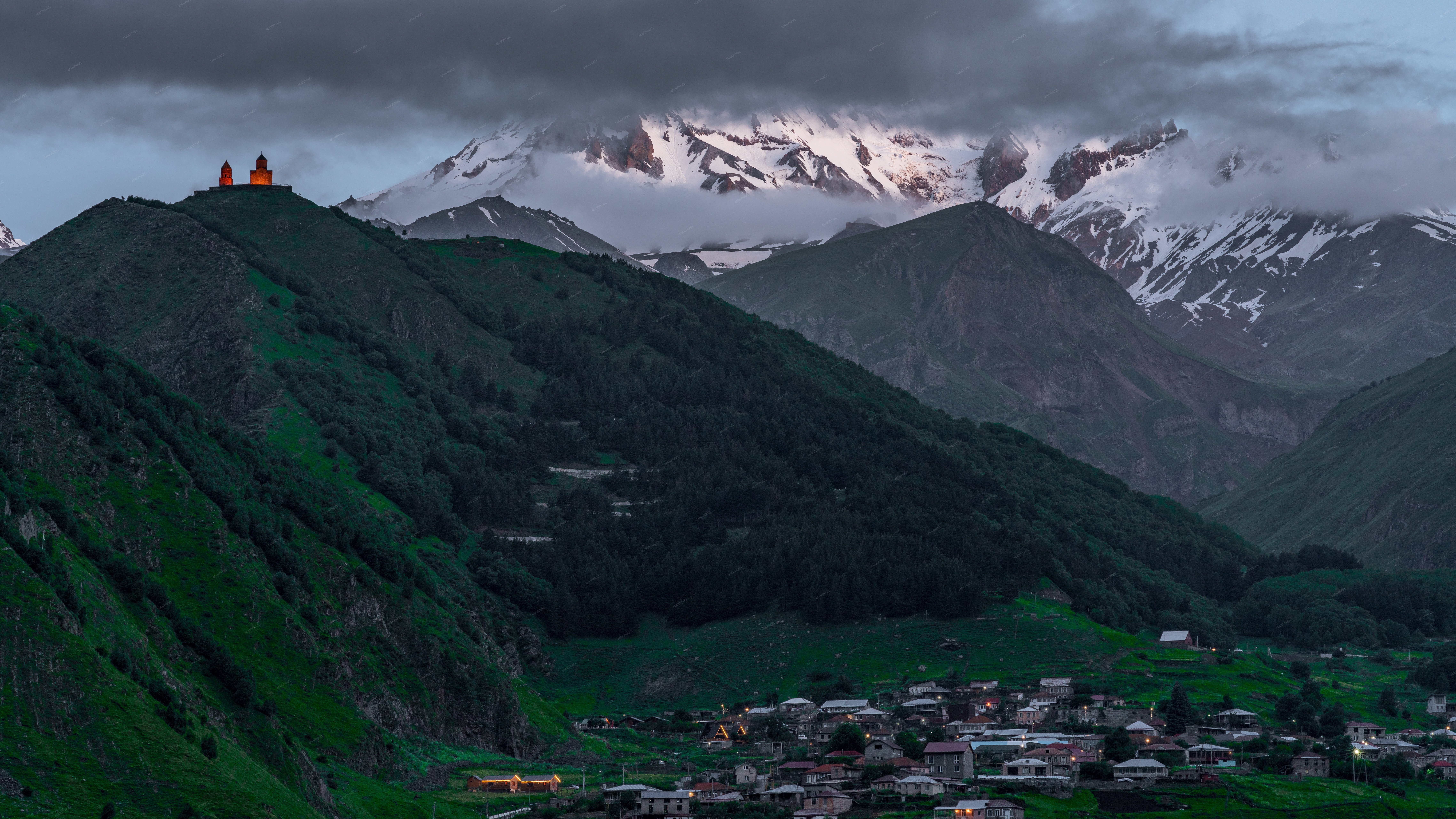 Kazbegi A Mountainous Landscape With A Prominent Peak - Full size view