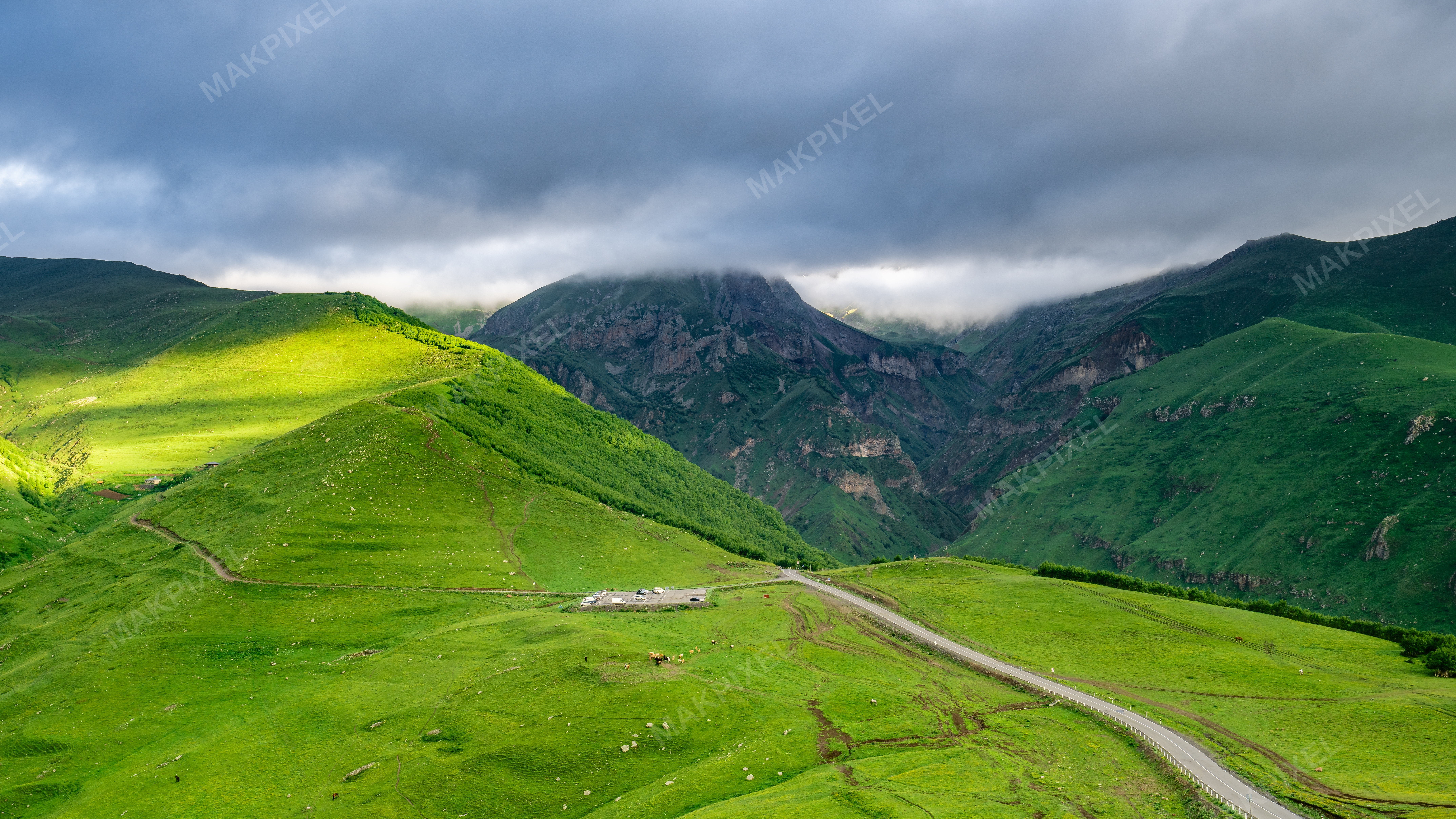 Kazbegi View Mountainous Landscape Under Overcast Sky. - Full size view