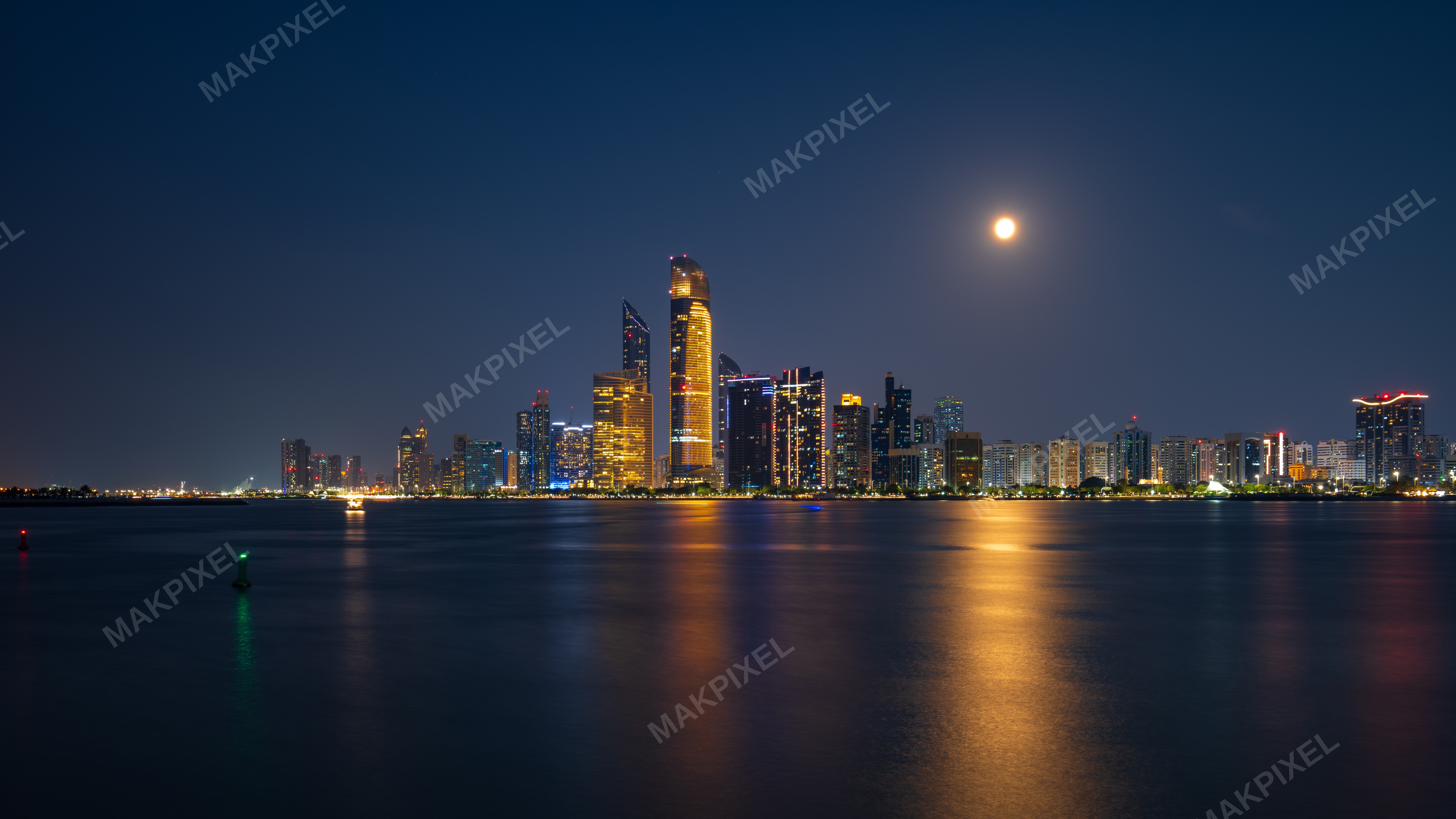Abu dhabi Nighttime Cityscape Prominent Skyline Featuring Illuminated - Full size view