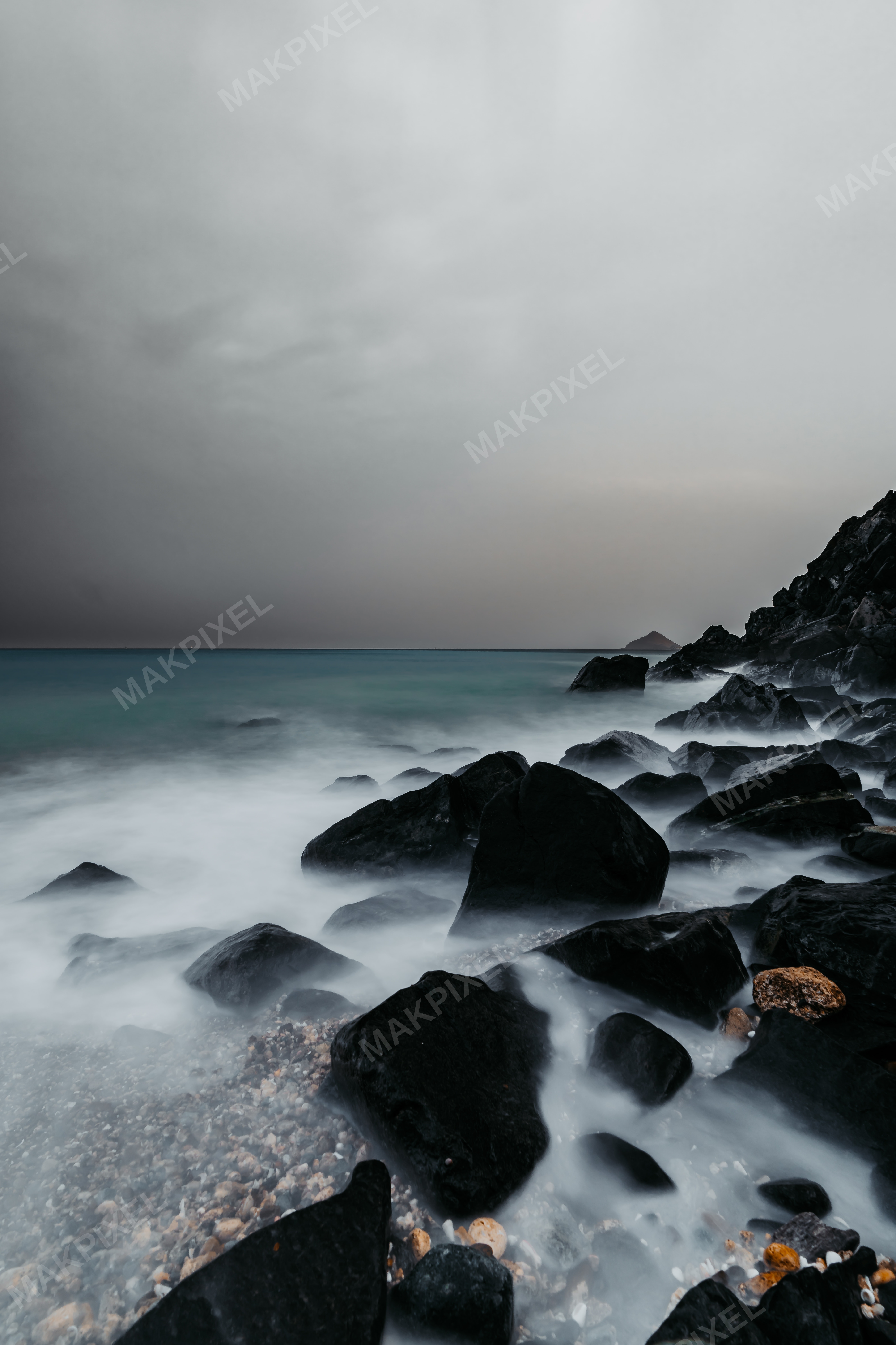 Coastal Scene Focus Ocean Shoreline. Foreground Shows Rocky - Full size view