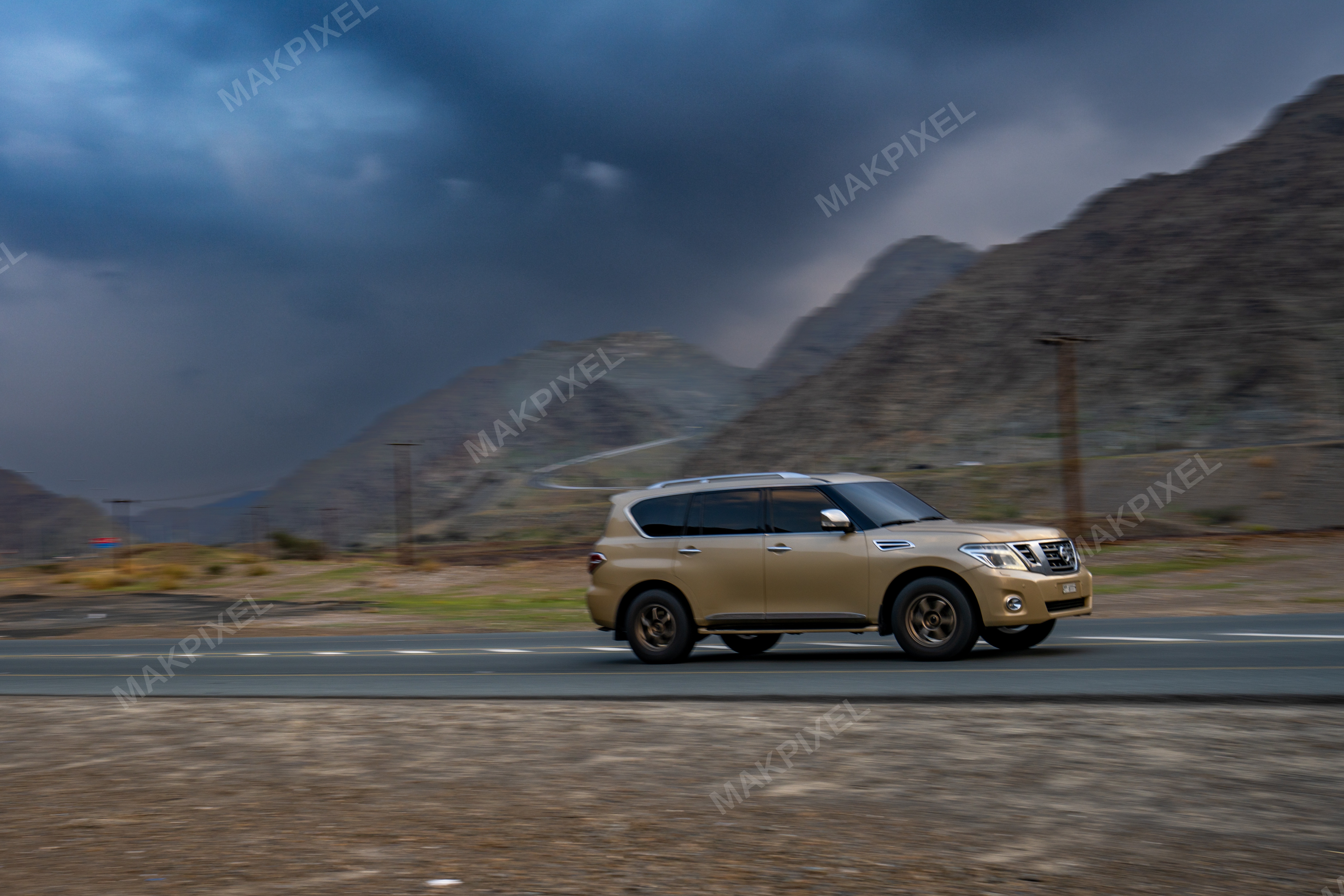 Nissan Patrol Gold SUV on Mountain Road, Masafi UAE – Adventure Travel - Full size view