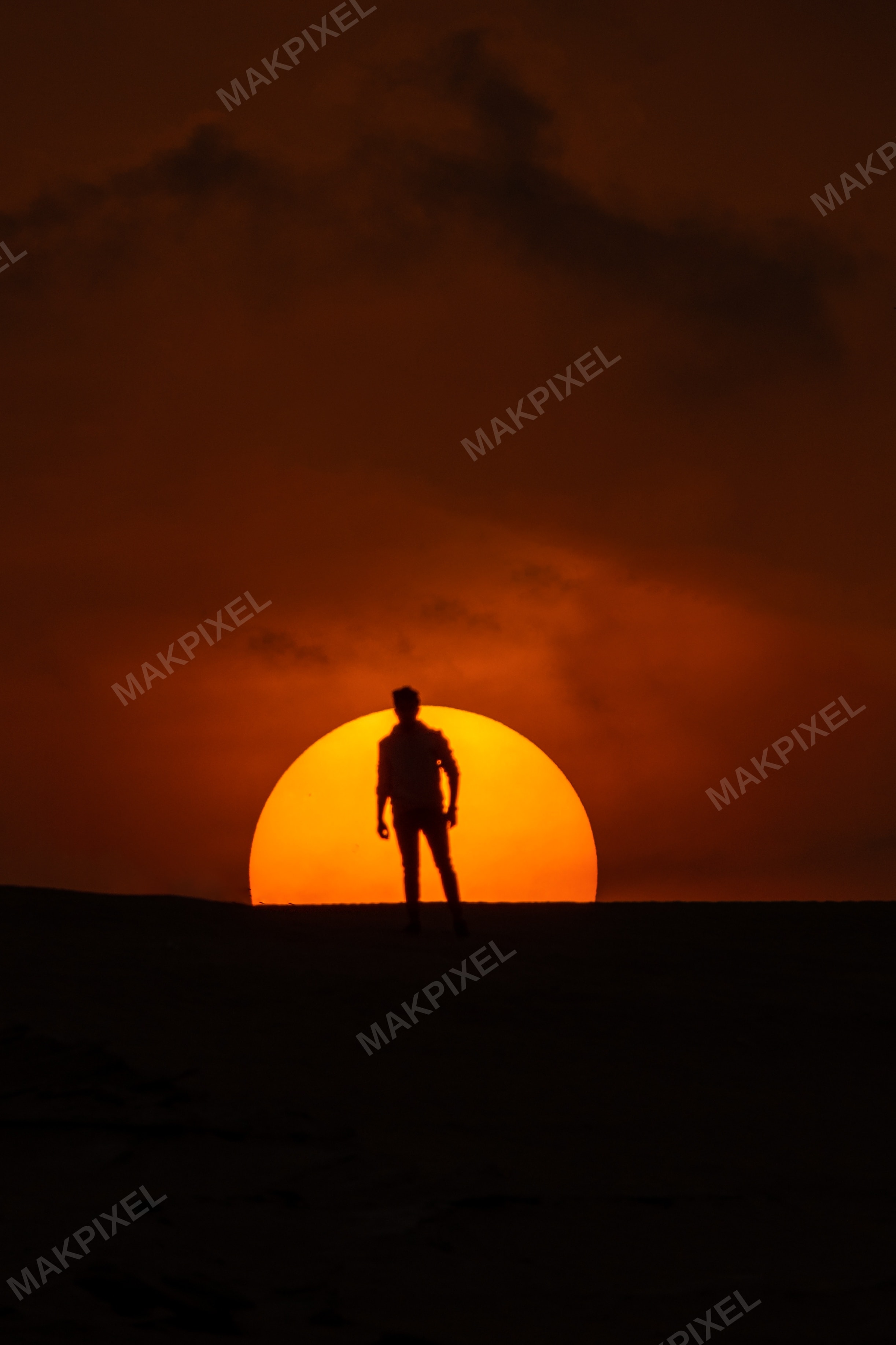 Desert Silhouette with Setting Sun | Person at Sunset, Dramatic Orange - Full size view