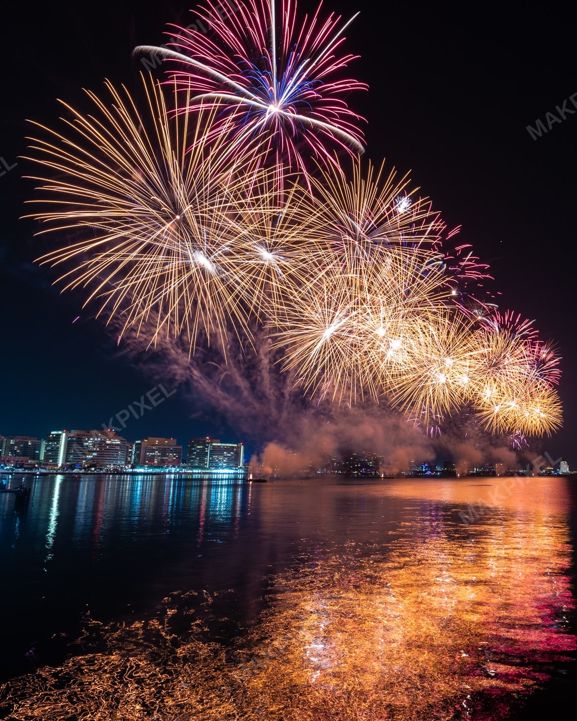UAE Waterfront Fireworks Show – Colorful Night City Skyline Reflection - Full size view