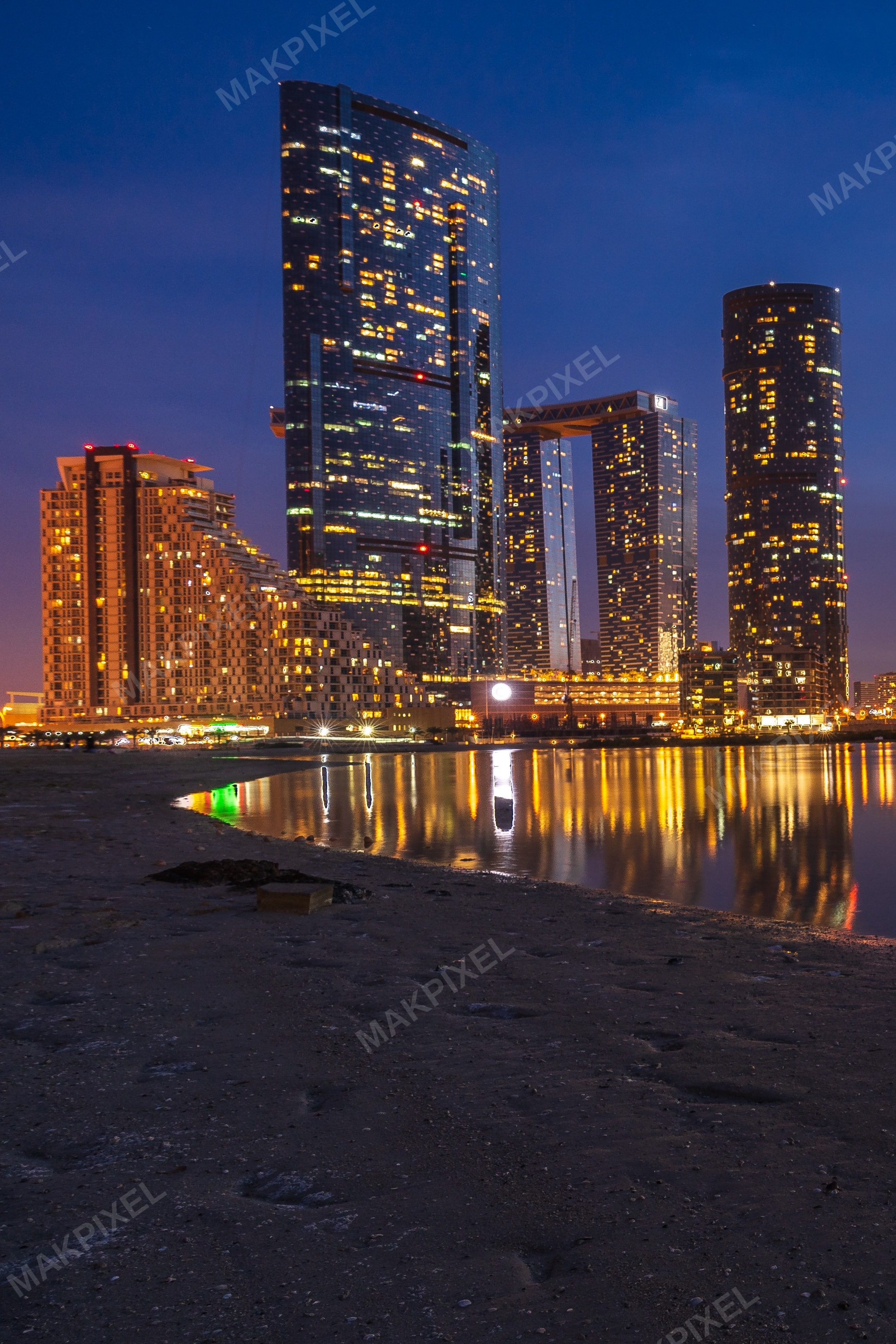 Abu Dhabi Modern Skyline at Blue Hour – Illuminated Towers and Reflect - Full size view