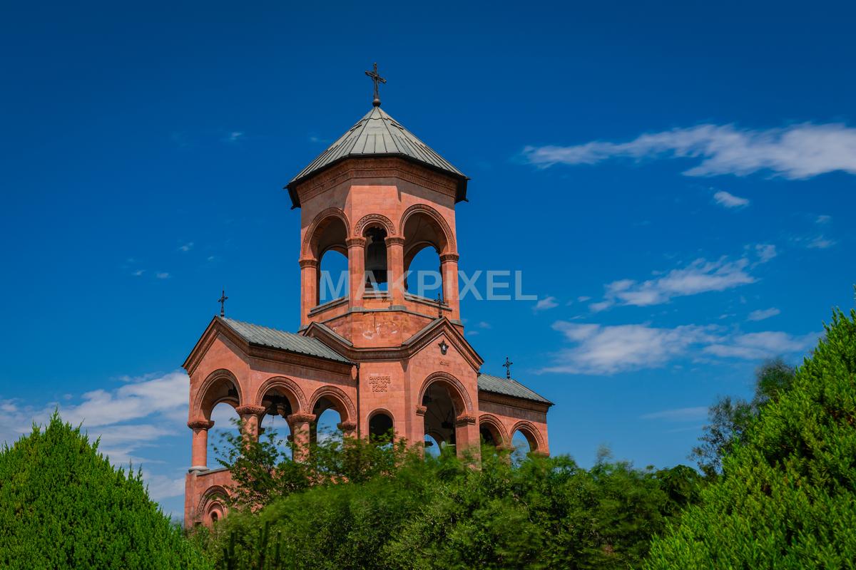 The landmark in the image is a church with a prominent be... - 5693×3795 stock photo