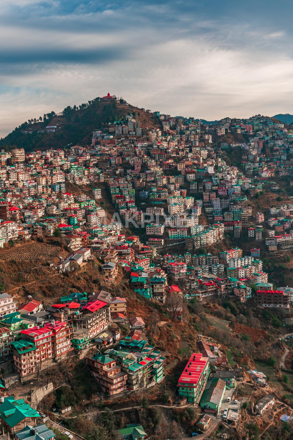 Aerial view of a mountainous region with numerous colorful - 3131×4697 stock photo