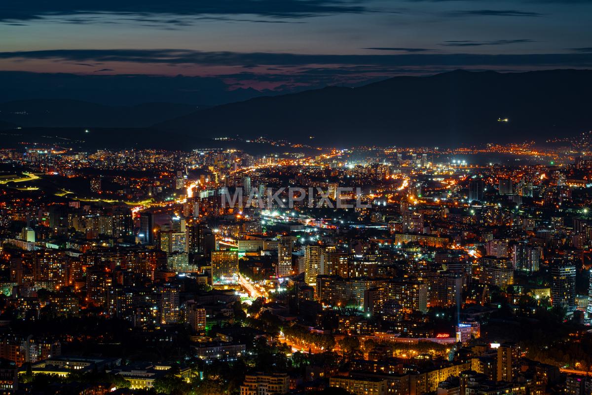 Nighttime cityscape with a focus on the skyline Tbilisi, Georgia - 8619×5746 stock photo