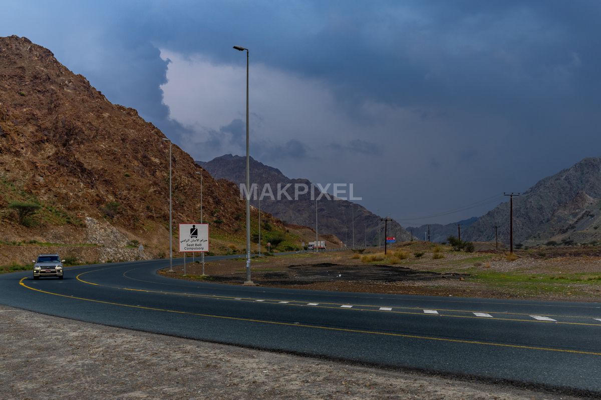 Curved Mountain Road Car Masafi Scenic Drive Dramatic Landscape - 6881×4587 stock photo