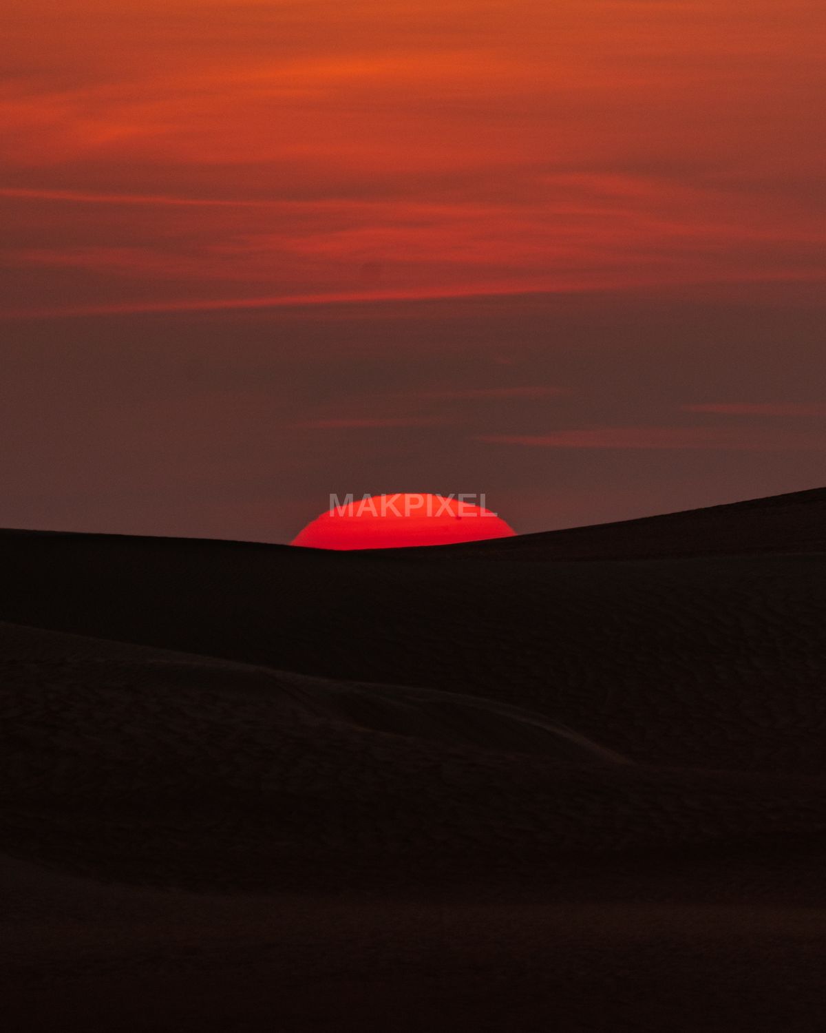 Desert Sunset Over Sand Dunes, Abu Dhabi – Vibrant Red Sky - 3482×4352 stock photo