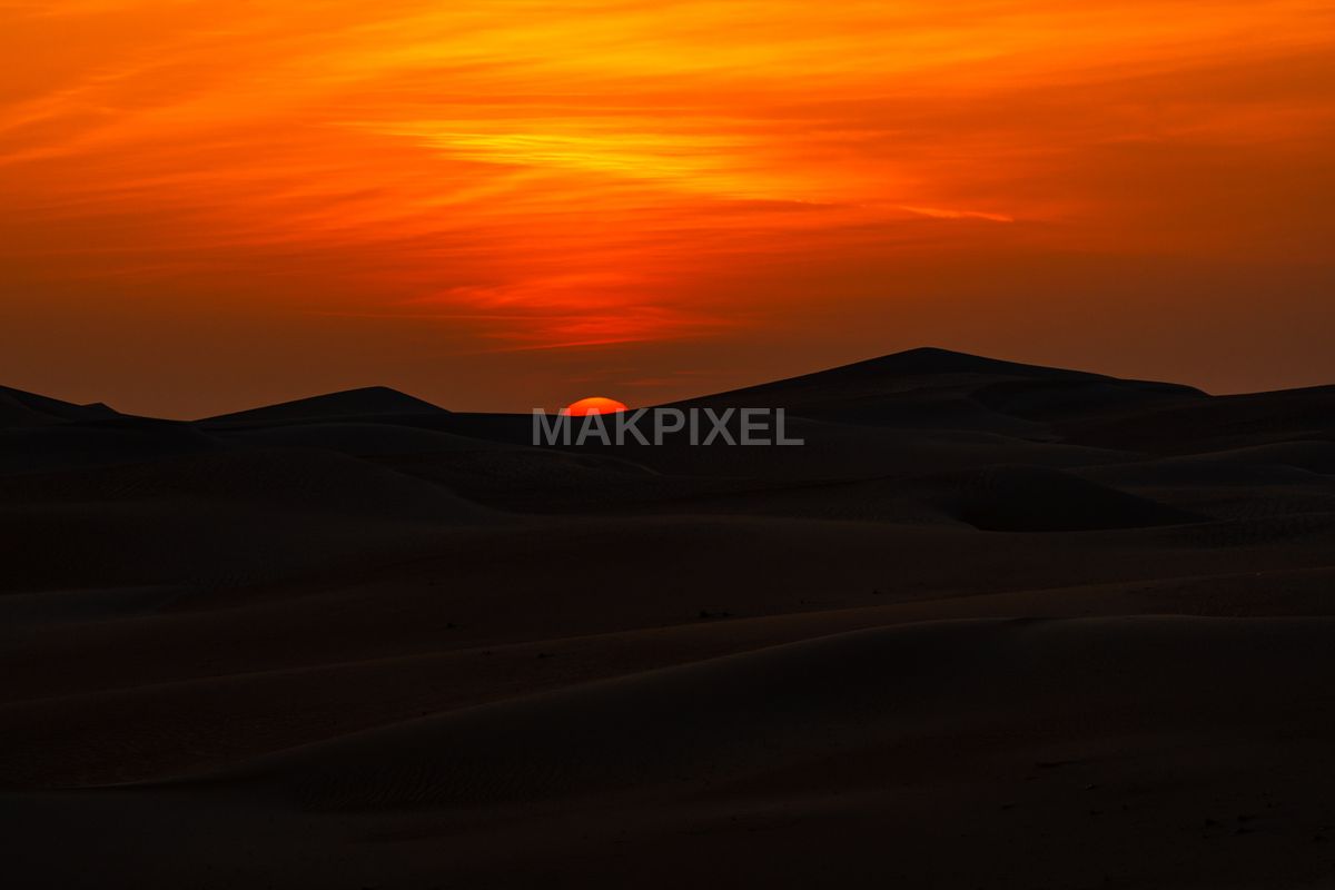 Sunset Over Sand Dunes, abu Dhabi Dramatic Orange Sky - 7008×4672 stock photo