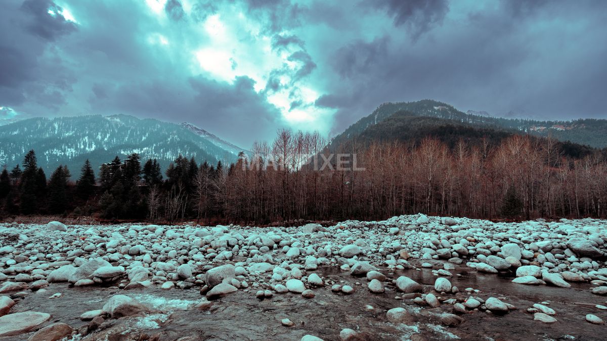 Snowy Rocky River Valley Himalayas Winter Mountain Serene - 6849×3853 stock photo