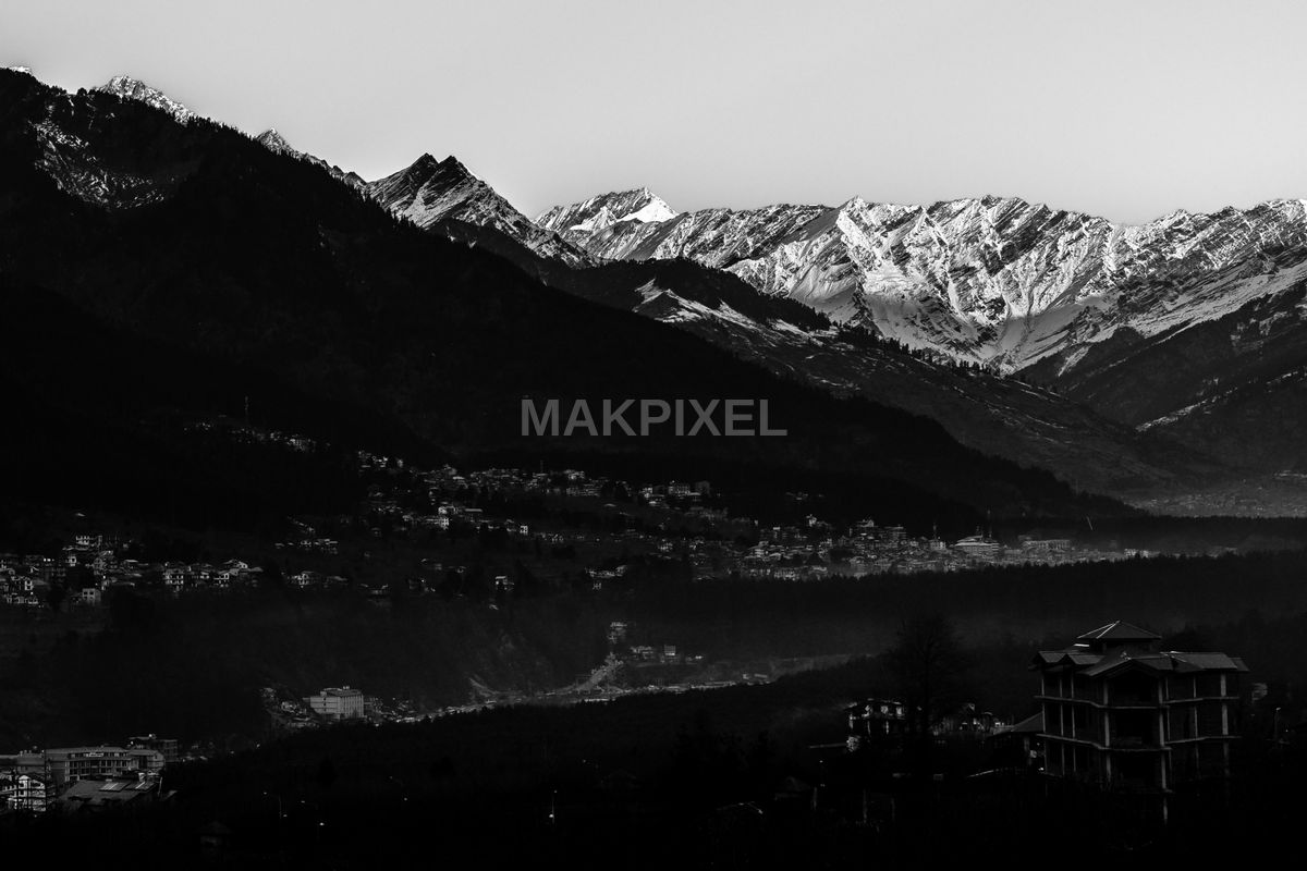 Black and White Snowy Himalayan Peaks Panoramic Mountain Town - 3630×2420 stock photo