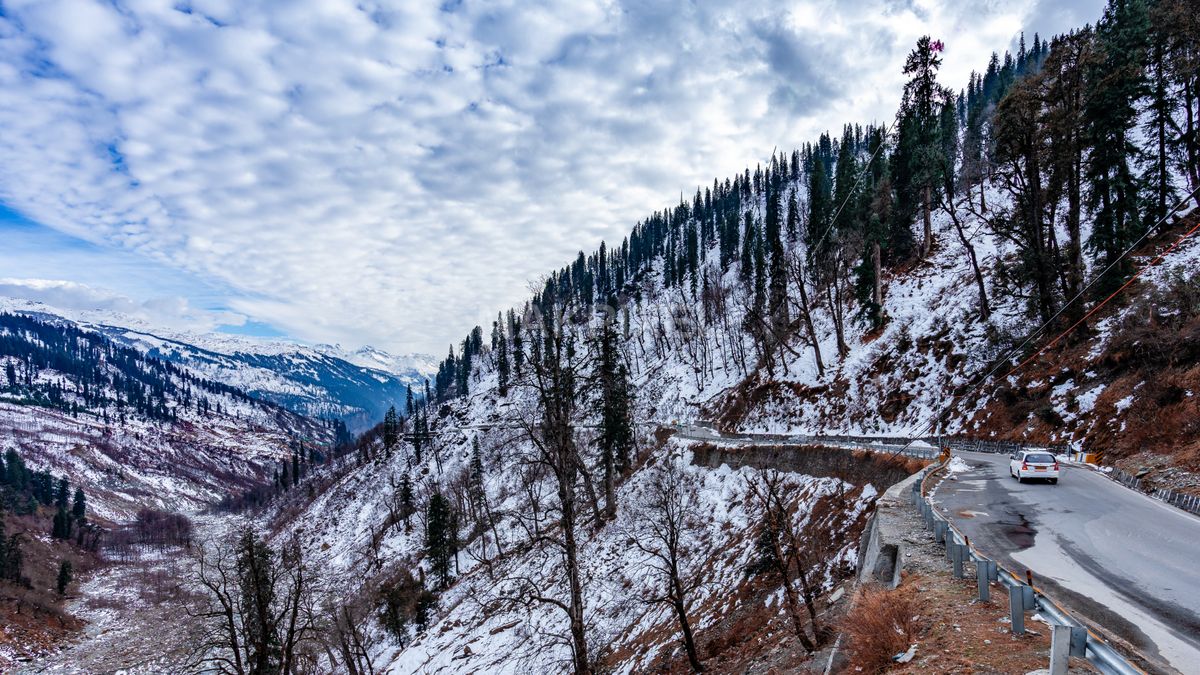 Winding Snowy Mountain Road Himalayan Valley Winter Travel - 6582×3702 stock photo