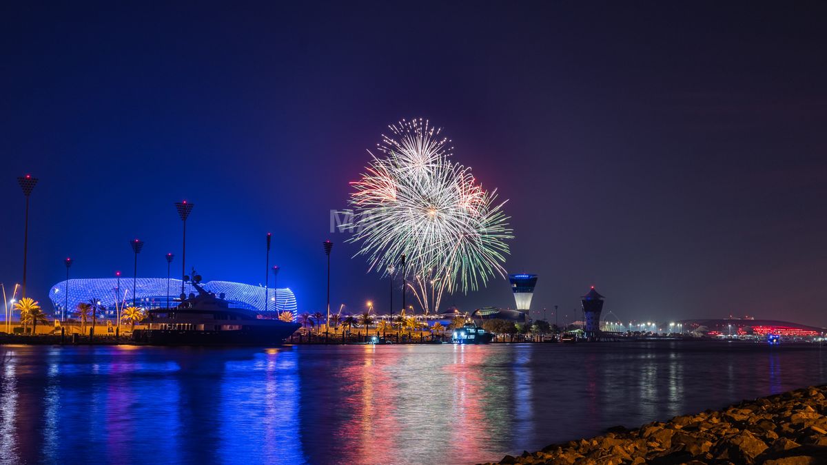 Yas Marina Abu Dhabi Fireworks Night | Illuminated Waterfront, Boats - 4472×2516 stock photo