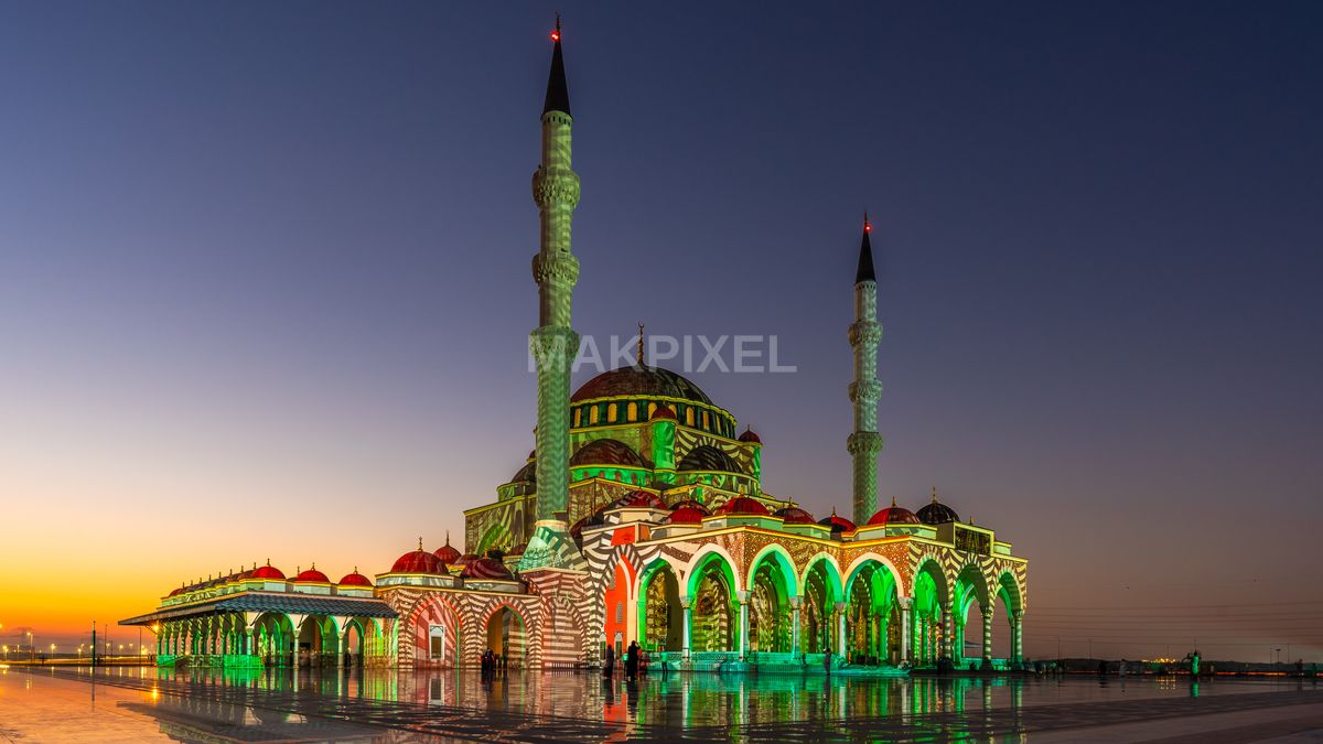 Sharjah Grand Mosque With Moon – Dusk Light Festival Color Projection - 5191×2920 stock photo